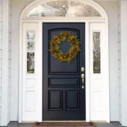 24" Feel Real® Classical Collection Wreath With Red Berries, Cedar Leaves & Warm White LED Lights 8 24" Feel Real® Classical Collection Wreath With Red Berries, Cedar Leaves & Warm White LED Lights -Michaels Store D206637S 2