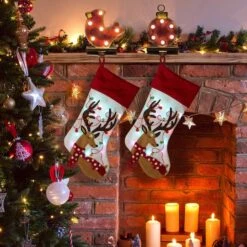 Glitzhome® 21" LED Reindeer Christmas Stockings, 2ct. -Michaels Store D252853S 2