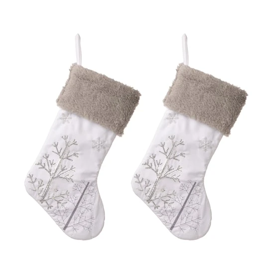 Glitzhome® 21" White Fleece With Christmas Tree & Snowflake Stocking, 2ct. 1 Glitzhome® 21" White Fleece With Christmas Tree & Snowflake Stocking, 2ct.