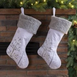 Glitzhome® 21" White Fleece With Christmas Tree & Snowflake Stocking, 2ct. 10 Glitzhome® 21" White Fleece With Christmas Tree & Snowflake Stocking, 2ct. -Michaels Store D252907S 2