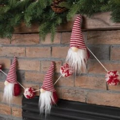 Glitzhome® 6ft. Red & White Fabric Christmas Gnome Garland -Michaels Store D253596S 3