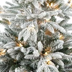 5ft. Pre-Lit Flocked Manchester Spruce Artificial Christmas Tree In Tower Planter, Clear Lights 10 5ft. Pre-Lit Flocked Manchester Spruce Artificial Christmas Tree In Tower Planter, Clear Lights -Michaels Store D322791S 4