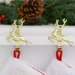 Original MantleClip® Gold Reindeer Icons Stocking Holders, 2ct. -Michaels Store D349375S 2