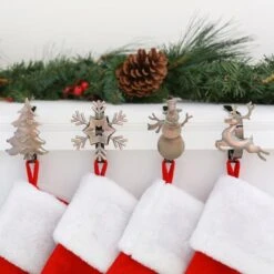 Original MantleClip® Oil-Rubbed Bronze Assorted Holiday Icons Stocking Holders, 4ct. -Michaels Store D349378S 2