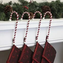 Haute Decor Classic Candy Cane Stocking Holders, 4ct. 5 Haute Decor Classic Candy Cane Stocking Holders, 4ct. -Michaels Store D349423S 2