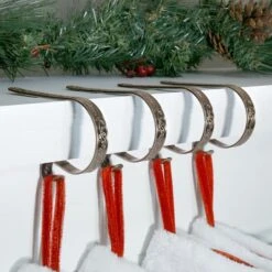 Original MantleClip® Holly Embossed Oil-Rubbed Bronze Stocking Holders, 4ct. -Michaels Store D349590S 2