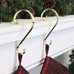 Haute Decor Stocking Scroll® Brass Stocking Holders, 2ct. -Michaels Store D349623S 2