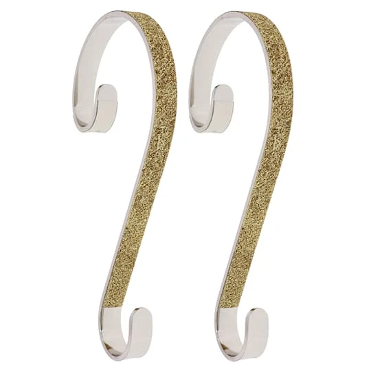Haute Decor Stocking Scroll® Gold Glitter Stocking Holders, 2ct. 1 Haute Decor Stocking Scroll® Gold Glitter Stocking Holders, 2ct.