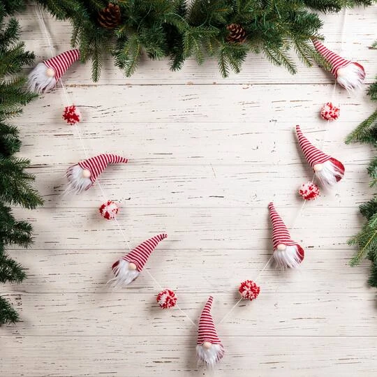 Glitzhome® 6ft. Red & White Fabric Christmas Gnome Garland, 2ct. 3 Glitzhome® 6ft. Red & White Fabric Christmas Gnome Garland, 2ct. - Image 3