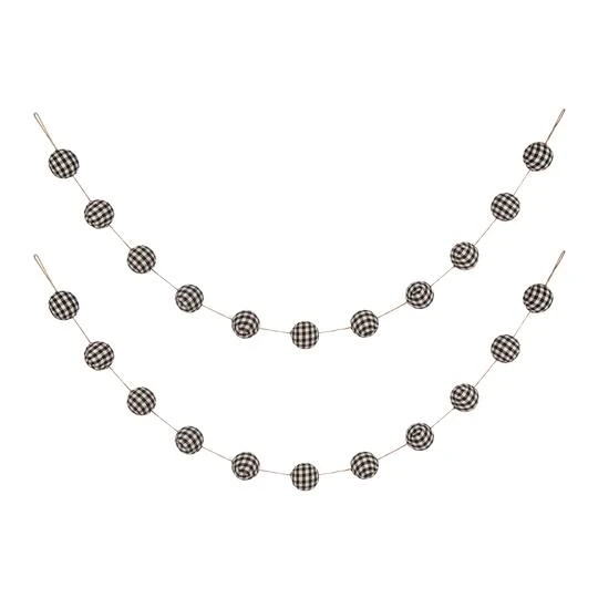 Glitzhome® 6ft. Black & White Plaid Fabric Garland, 2ct. 1 Glitzhome® 6ft. Black & White Plaid Fabric Garland, 2ct.