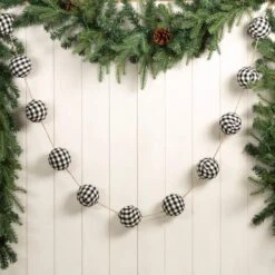 Glitzhome® 6ft. Black & White Plaid Fabric Garland, 2ct. 11 Glitzhome® 6ft. Black & White Plaid Fabric Garland, 2ct. -Michaels Store D445246S 2