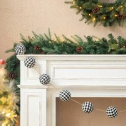 Glitzhome® 6ft. Black & White Plaid Fabric Garland, 2ct. 14 Glitzhome® 6ft. Black & White Plaid Fabric Garland, 2ct. -Michaels Store D445246S 6