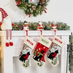 Glitzhome® 7" Santa, Snowman & Penguin Stocking Holder Set -Michaels Store D479500S 3