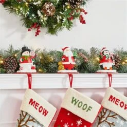 Glitzhome® 7" Santa, Snowman & Penguin Stocking Holder Set -Michaels Store D479500S 4