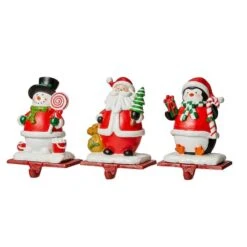 Glitzhome® 7" Santa, Snowman & Penguin Stocking Holder Set -Michaels Store D479500S 6