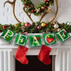 Impact 4.5ft. Shimmering Green Lighted Peace Garland -Michaels Store D491001S 3