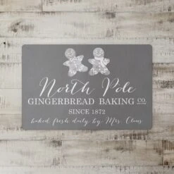 North Pole Gingerbread Co. 27x18 Floor Mat 5 North Pole Gingerbread Co. 27x18 Floor Mat -Michaels Store D518023S 2