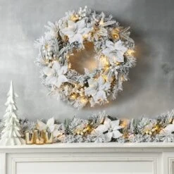 Glitzhome® 24" Pre-Lit Snow Flocked Greenery Pine Poinsettia Christmas Wreath -Michaels Store D652255S 2
