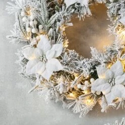 Glitzhome® 24" Pre-Lit Snow Flocked Greenery Pine Poinsettia Christmas Wreath -Michaels Store D652255S 4