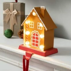 Glitzhome® 6.75'' Marquee LED Gingerbread House Metal Christmas Stocking Holder -Michaels Store D652342S 2