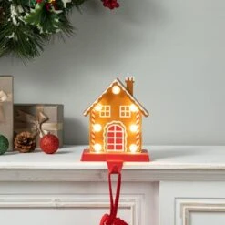 Glitzhome® 6.75'' Marquee LED Gingerbread House Metal Christmas Stocking Holder -Michaels Store D652342S 5