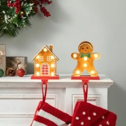 Glitzhome® Marquee LED Gingerbread House & Gingerbread Man Christmas Stocking Holder Set 12 Glitzhome® Marquee LED Gingerbread House & Gingerbread Man Christmas Stocking Holder Set -Michaels Store D652344S 3